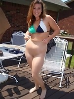 A summer day in the pool with chubby MILF Dawn Desire swimming in her sexy suntan pantyhose